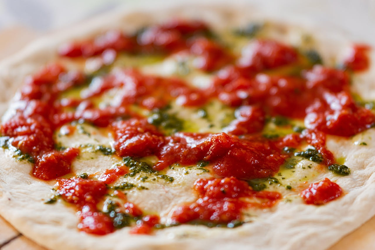 Extravergine, vergine o olio di semi: cosa cambia sulla pizza