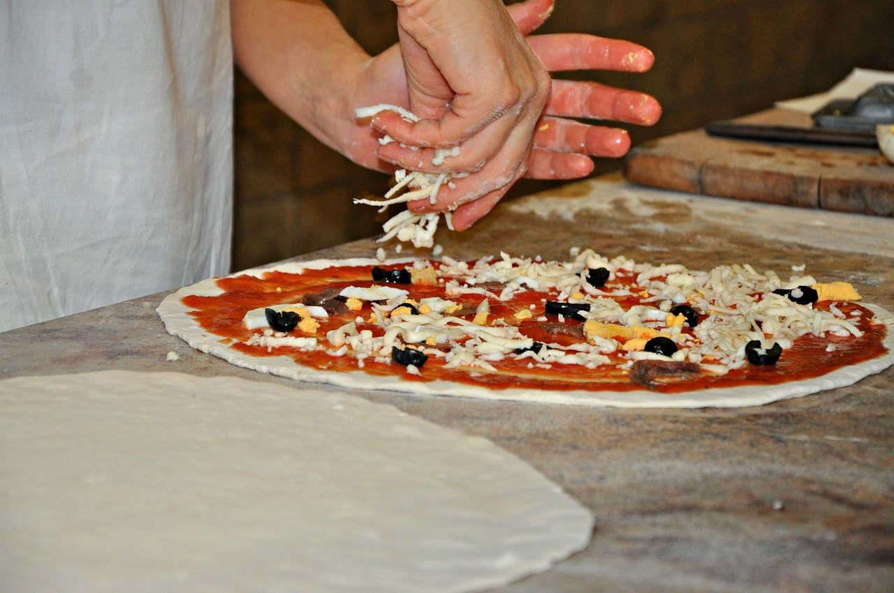 Gli impasti da cui discende la pizza: com'erano i primi della storia