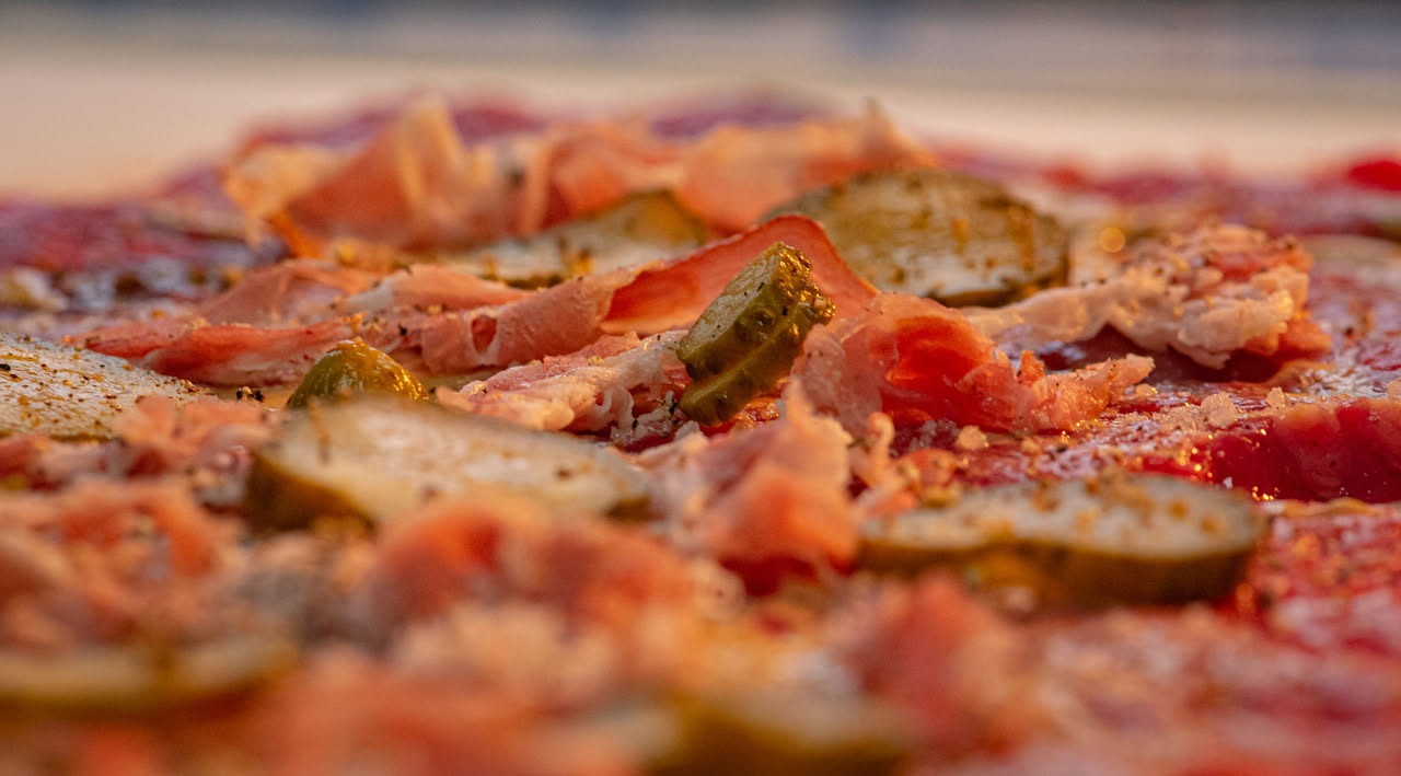 Quali ingredienti erano un lusso sulla pizza e quando hanno smesso di esserlo