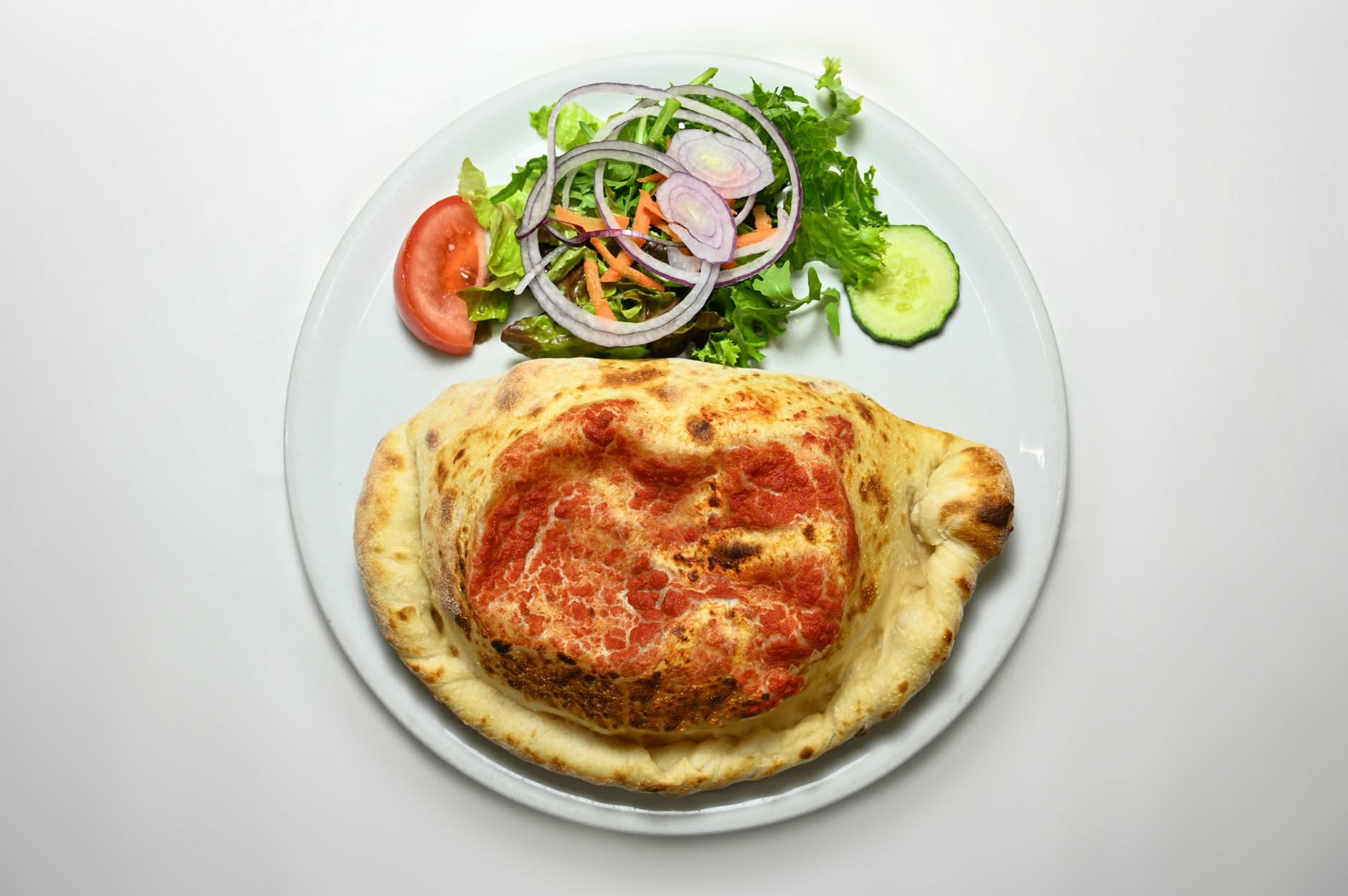 Il calzone al forno: la ricetta e come si chiude senza farlo aprire